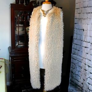What? A trendy, furry, knee-length vest sz Med!
